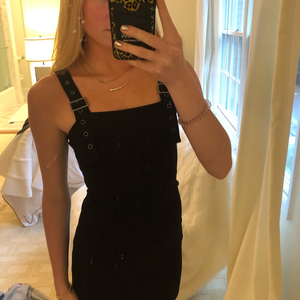 Black buckle dress